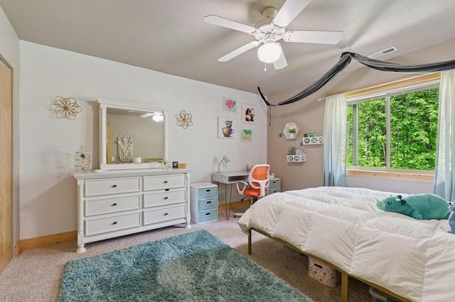 14132 Pine St, Bigfork, MT 59911 - bedroom featuring light colored carpet, a ceiling fan, and baseboards