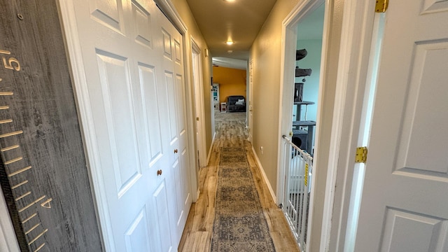 3319 Ivy Dr, Helena, MT 59602 - hallway with light wood finished floors and recessed lighting