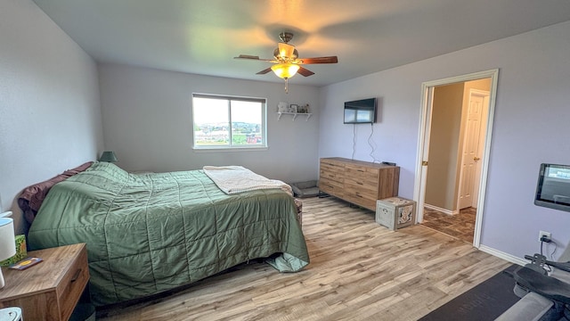 3319 Ivy Dr, Helena, MT 59602 - bedroom featuring light wood-type flooring, ceiling fan, baseboards, and heating unit
