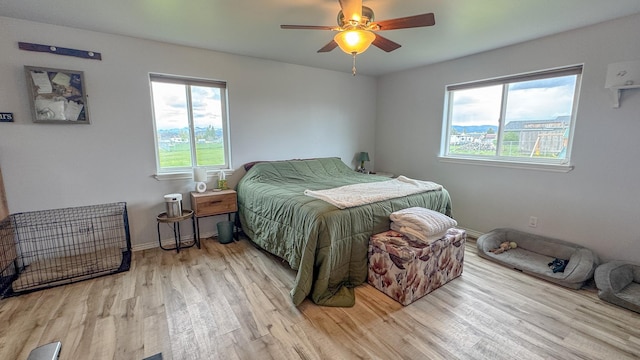 3319 Ivy Dr, Helena, MT 59602 - bedroom featuring wood finished floors, baseboards, and ceiling fan