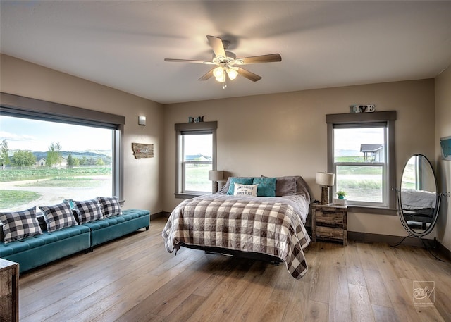 4731 Sea Ray Rd, Helena, MT 59602 - bedroom featuring light wood-style floors, baseboards, and ceiling fan