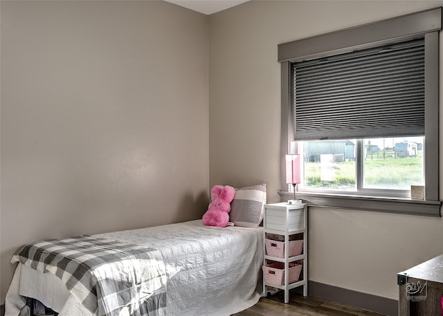4731 Sea Ray Rd, Helena, MT 59602 - bedroom with dark wood-style flooring and baseboards