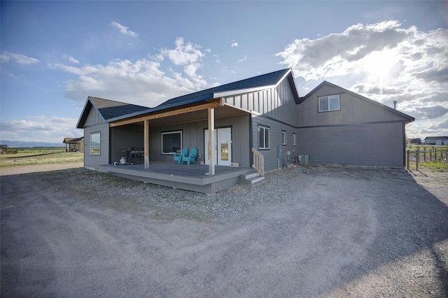 4731 Sea Ray Rd, Helena, MT 59602 - view of front facade featuring driveway and board and batten siding