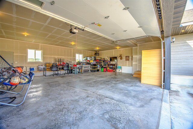 4731 Sea Ray Rd, Helena, MT 59602 - garage featuring a garage door opener