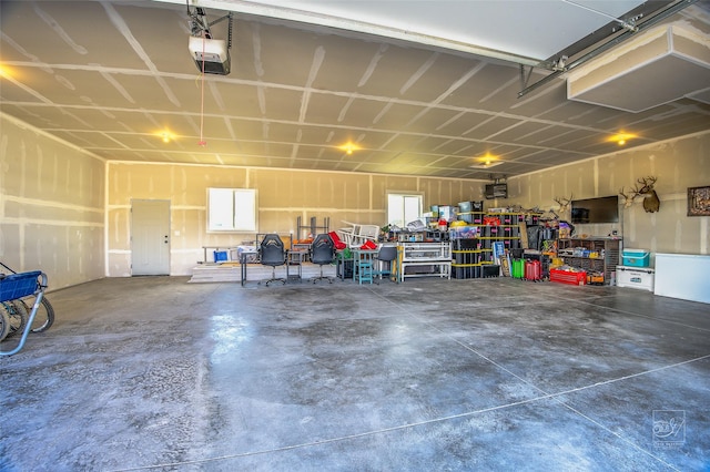 4731 Sea Ray Rd, Helena, MT 59602 - garage featuring a garage door opener