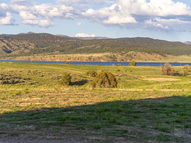 4731 Sea Ray Rd, Helena, MT 59602 - view of mountain backdrop with a nearby body of water