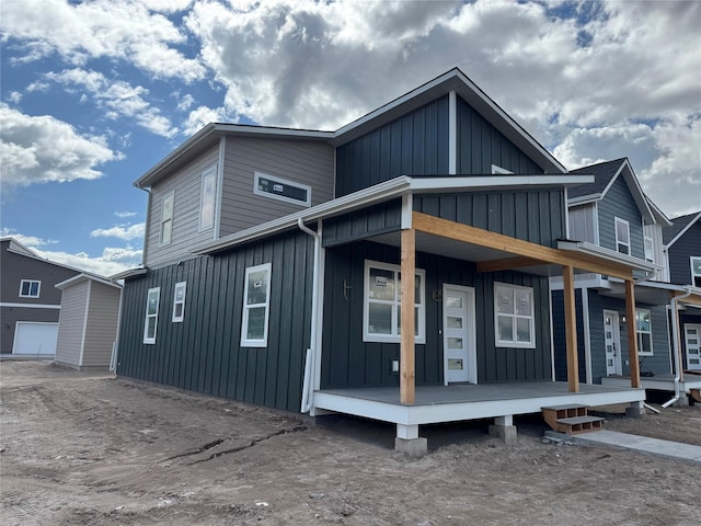 2283 Depot Way, Missoula, MT 59808 - view of front of home featuring board and batten siding and a porch