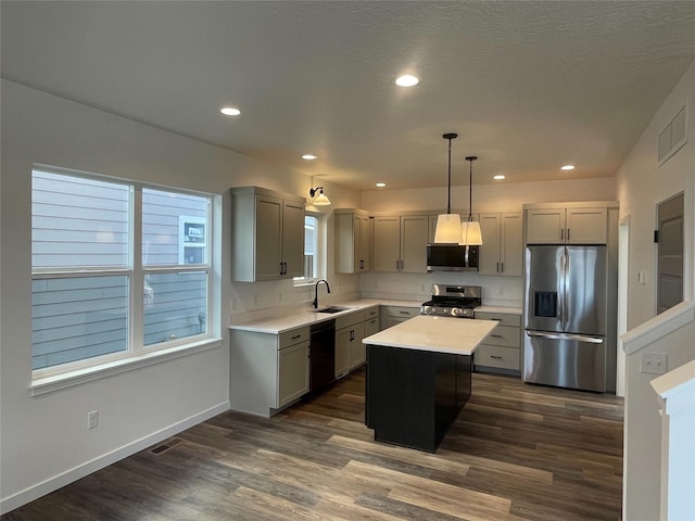 2283 Depot Way, Missoula, MT 59808 - kitchen featuring stainless steel appliances, a sink, gray cabinetry, light countertops, and recessed lighting