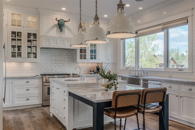 3070 River Lakes Dr, Whitefish, MT 59937 - kitchen with a sink, stainless steel appliances, white cabinetry, and recessed lighting
