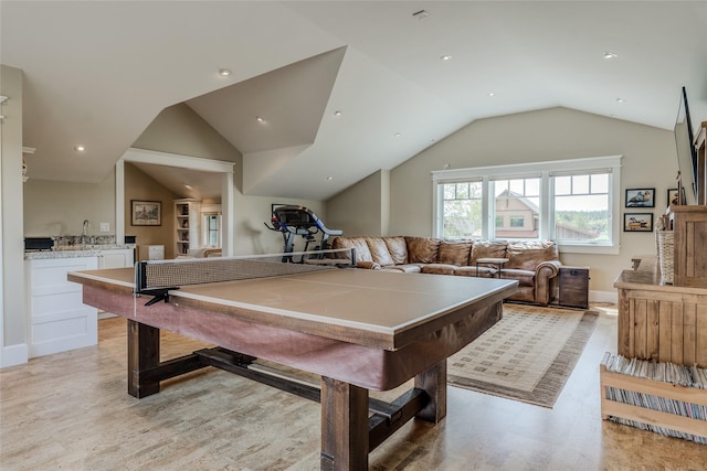 3070 River Lakes Dr, Whitefish, MT 59937 - rec room with lofted ceiling, light wood-style floors, baseboards, and recessed lighting