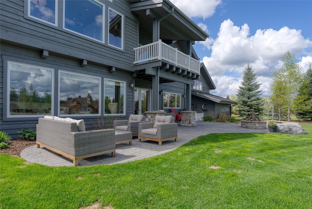 3070 River Lakes Dr, Whitefish, MT 59937 - back of property featuring a patio area, a yard, a balcony, and outdoor lounge area