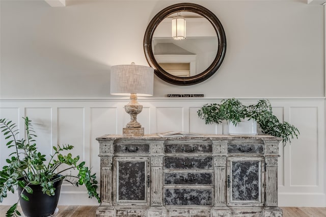 3070 River Lakes Dr, Whitefish, MT 59937 - detailed view of a decorative wall, wainscoting, and wood finished floors