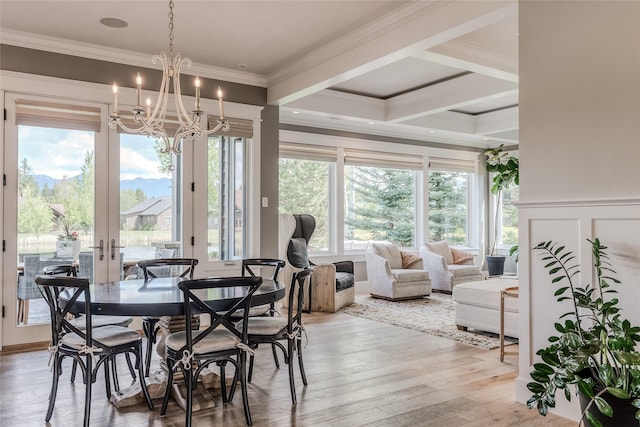 3070 River Lakes Dr, Whitefish, MT 59937 - dining space with a chandelier, crown molding, light wood-style floors, french doors, and beamed ceiling