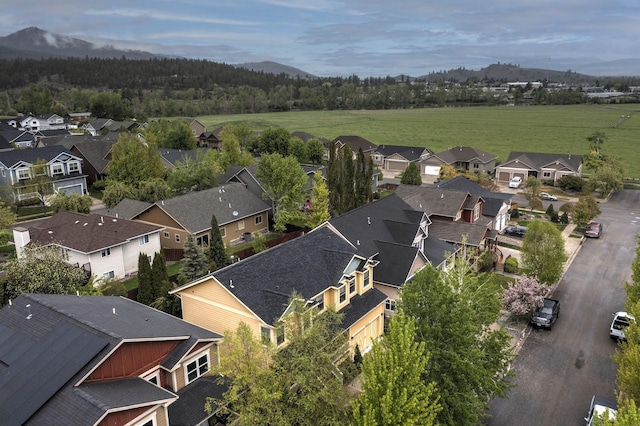 6021 Hobson Ln, Missoula, MT 59803 - aerial perspective of suburban area with a mountain backdrop