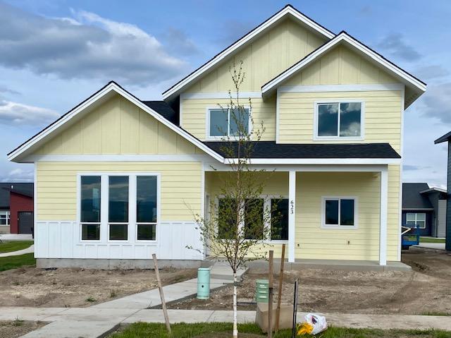 623 Holstein Way, Kalispell, MT 59901 - view of front facade with a porch and board and batten siding