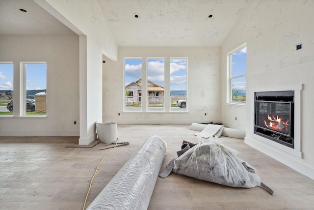623 Holstein Way, Kalispell, MT 59901 - living room with a glass covered fireplace and wood finished floors