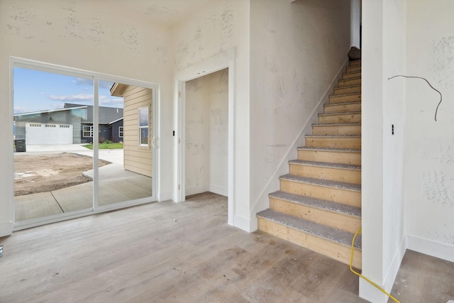 623 Holstein Way, Kalispell, MT 59901 - stairway with wood finished floors and baseboards