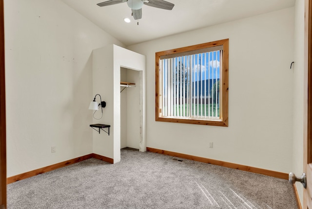 26 Two Rivers Rd, Saint Regis, MT 59866 - unfurnished bedroom featuring carpet floors, baseboards, a closet, and ceiling fan
