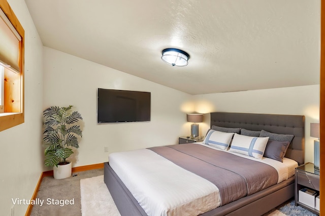 26 Two Rivers Rd, Saint Regis, MT 59866 - bedroom featuring carpet, lofted ceiling, and baseboards