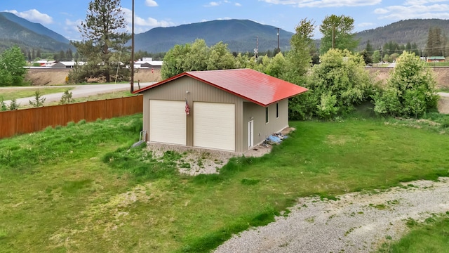 26 Two Rivers Rd, Saint Regis, MT 59866 - detached garage featuring a mountain view