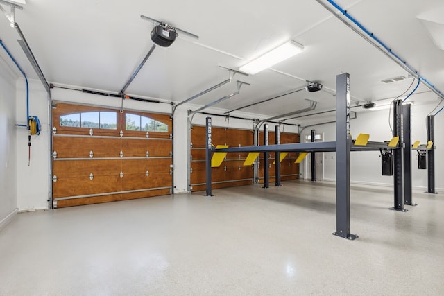 2761 Contour Rd, Missoula, MT 59802 - garage featuring a garage door opener