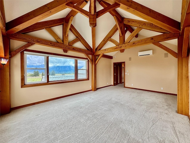 444 Windwalker Trl, Stevensville, MT 59870 - empty room featuring a wall mounted AC, light carpet, beam ceiling, baseboards, and high vaulted ceiling