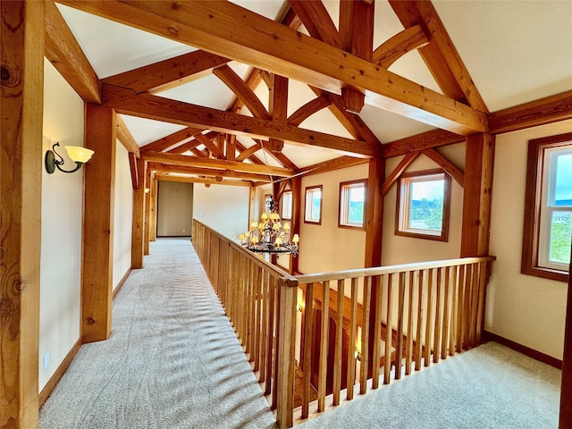 444 Windwalker Trl, Stevensville, MT 59870 - hall with a chandelier, light carpet, and baseboards