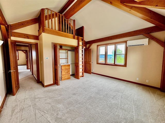 444 Windwalker Trl, Stevensville, MT 59870 - unfurnished bedroom with an AC wall unit, carpet flooring, and baseboards