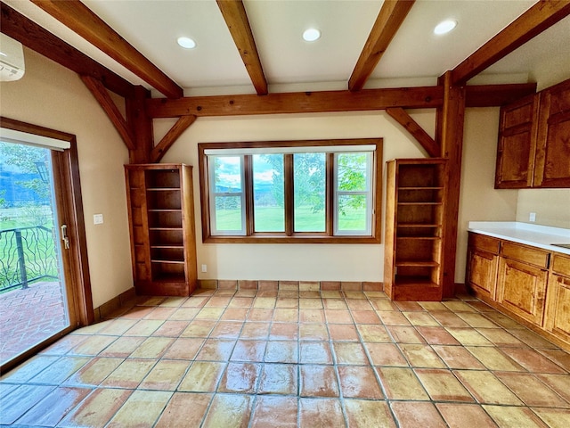 444 Windwalker Trl, Stevensville, MT 59870 - interior space featuring beam ceiling, healthy amount of natural light, recessed lighting, baseboards, and built in shelves