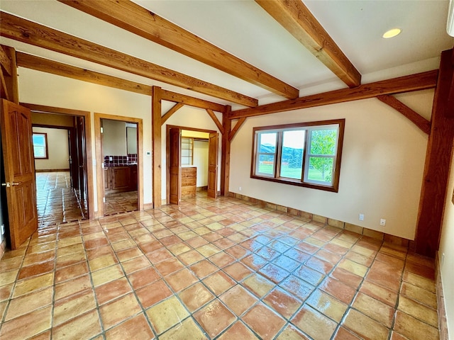 444 Windwalker Trl, Stevensville, MT 59870 - empty room featuring beam ceiling, baseboards, and recessed lighting