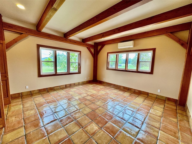 444 Windwalker Trl, Stevensville, MT 59870 - unfurnished room featuring a wall mounted AC, beamed ceiling, recessed lighting, and baseboards