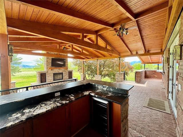 444 Windwalker Trl, Stevensville, MT 59870 - view of patio with exterior kitchen, beverage cooler, and an outdoor bar