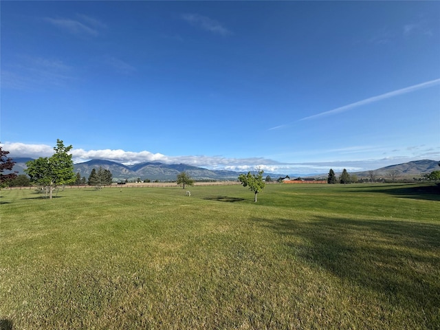 444 Windwalker Trl, Stevensville, MT 59870 - view of green lawn featuring a mountain view and a rural view