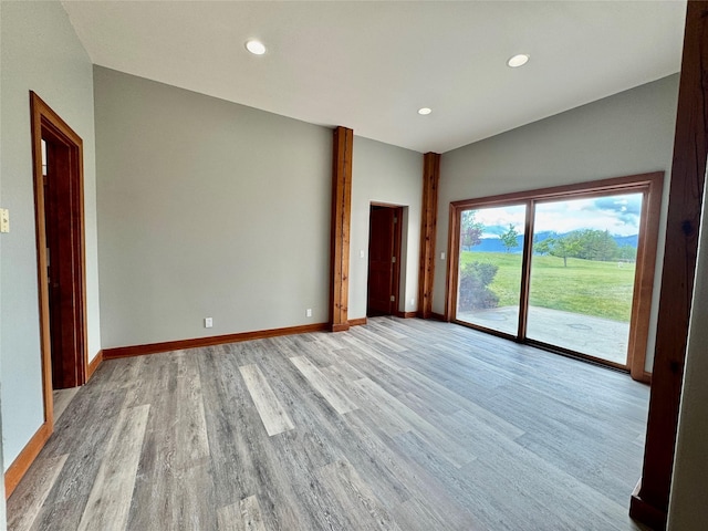 444 Windwalker Trl, Stevensville, MT 59870 - spare room featuring light wood finished floors, baseboards, and recessed lighting