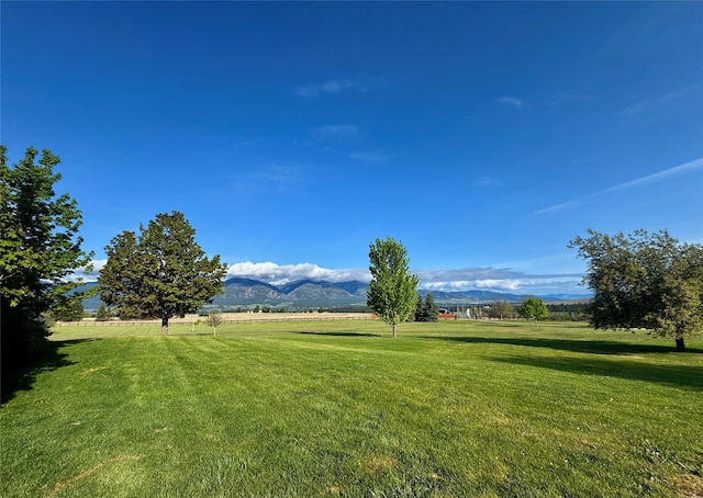 444 Windwalker Trl, Stevensville, MT 59870 - view of green lawn with a mountain view and a view of countryside