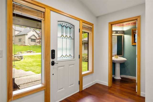 259 Eagle Bend Dr, Bigfork, MT 59911 - entryway featuring dark wood finished floors, healthy amount of natural light, baseboards, and vaulted ceiling