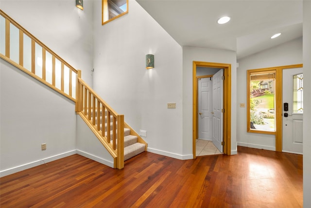 259 Eagle Bend Dr, Bigfork, MT 59911 - foyer with wood finished floors, stairway, baseboards, and recessed lighting
