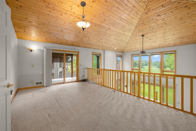 259 Eagle Bend Dr, Bigfork, MT 59911 - carpeted empty room with plenty of natural light, lofted ceiling, ceiling fan, and wood ceiling