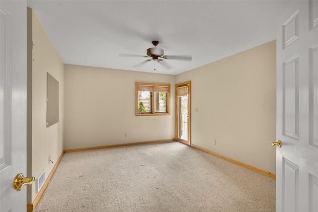 259 Eagle Bend Dr, Bigfork, MT 59911 - spare room featuring a ceiling fan, baseboards, and carpet