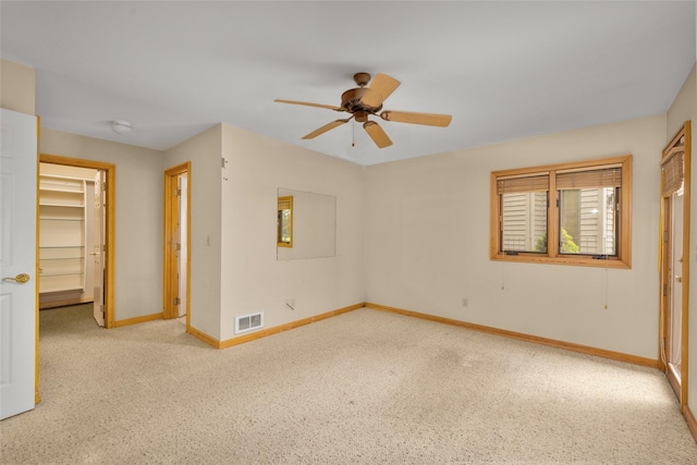 259 Eagle Bend Dr, Bigfork, MT 59911 - unfurnished room with baseboards, ceiling fan, and a smoke detector