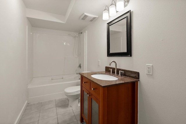 515 W Oregon St, Kalispell, MT 59901 - bathroom featuring toilet, vanity, tile patterned flooring, shower / washtub combination, and baseboards