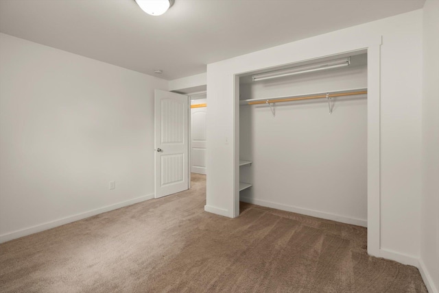515 W Oregon St, Kalispell, MT 59901 - unfurnished bedroom featuring carpet flooring, a closet, and baseboards