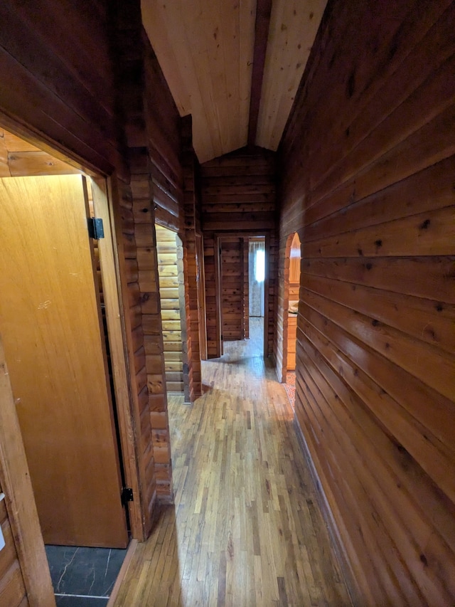 323 B St, Dixon, MT 59831 - hallway featuring wood walls, wood-type flooring, vaulted ceiling, and wooden ceiling