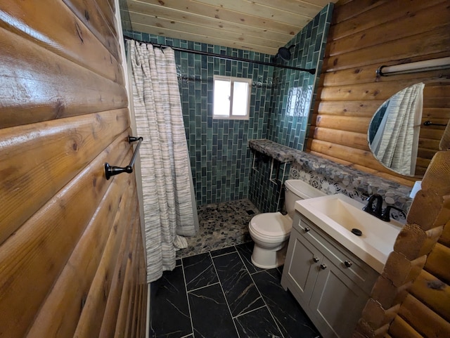 323 B St, Dixon, MT 59831 - bathroom with toilet, a tile shower, marble finish flooring, vanity, and log walls