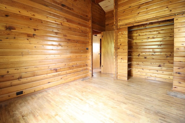 323 B St, Dixon, MT 59831 - empty room featuring wood finished floors and wooden walls