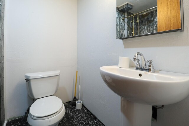 323 B St, Dixon, MT 59831 - full bath with tiled shower, toilet, and a sink