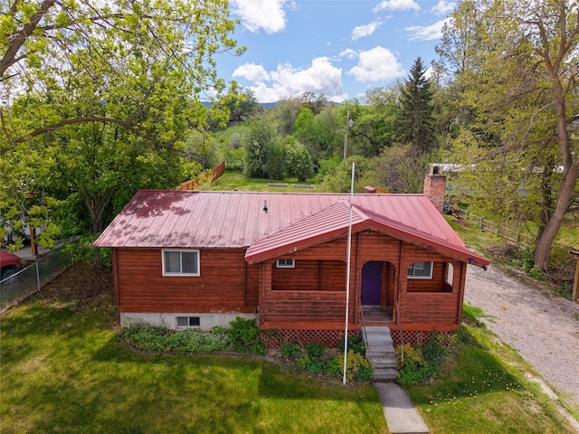 323 B St, Dixon, MT 59831 - rustic home with a chimney and metal roof