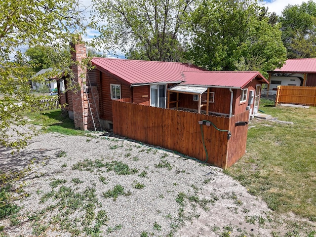 323 B St, Dixon, MT 59831 - rear view of house with a chimney and metal roof