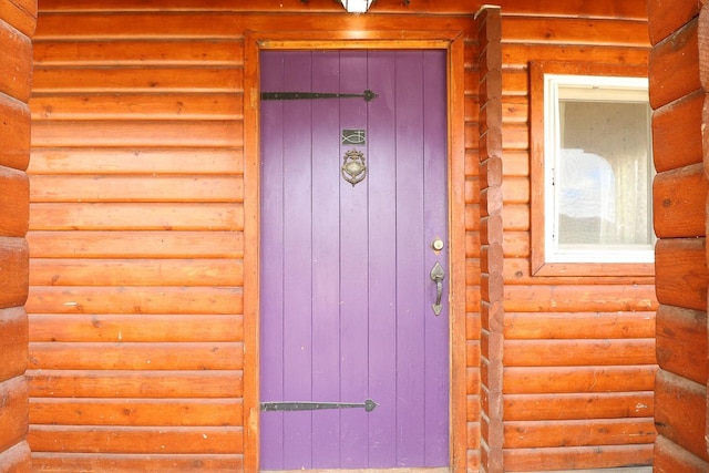 323 B St, Dixon, MT 59831 - doorway to property featuring log veneer siding