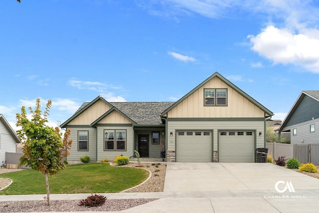 339 Elouise Cobell St, Helena, MT 59601 - craftsman-style home with driveway, board and batten siding, and an attached garage